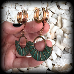 Inspired by Ishtar, Mesopotamian Goddess of love, beauty, sex and war, these beautiful patina and rose gold battle shield gauged earrings weigh approx 8 grams a piece, and measure just under 7 cms from tip to tip.

This pair have been made on 5/8” gauge (16mm) surgical steel cradles, suitable for stretched lobes.