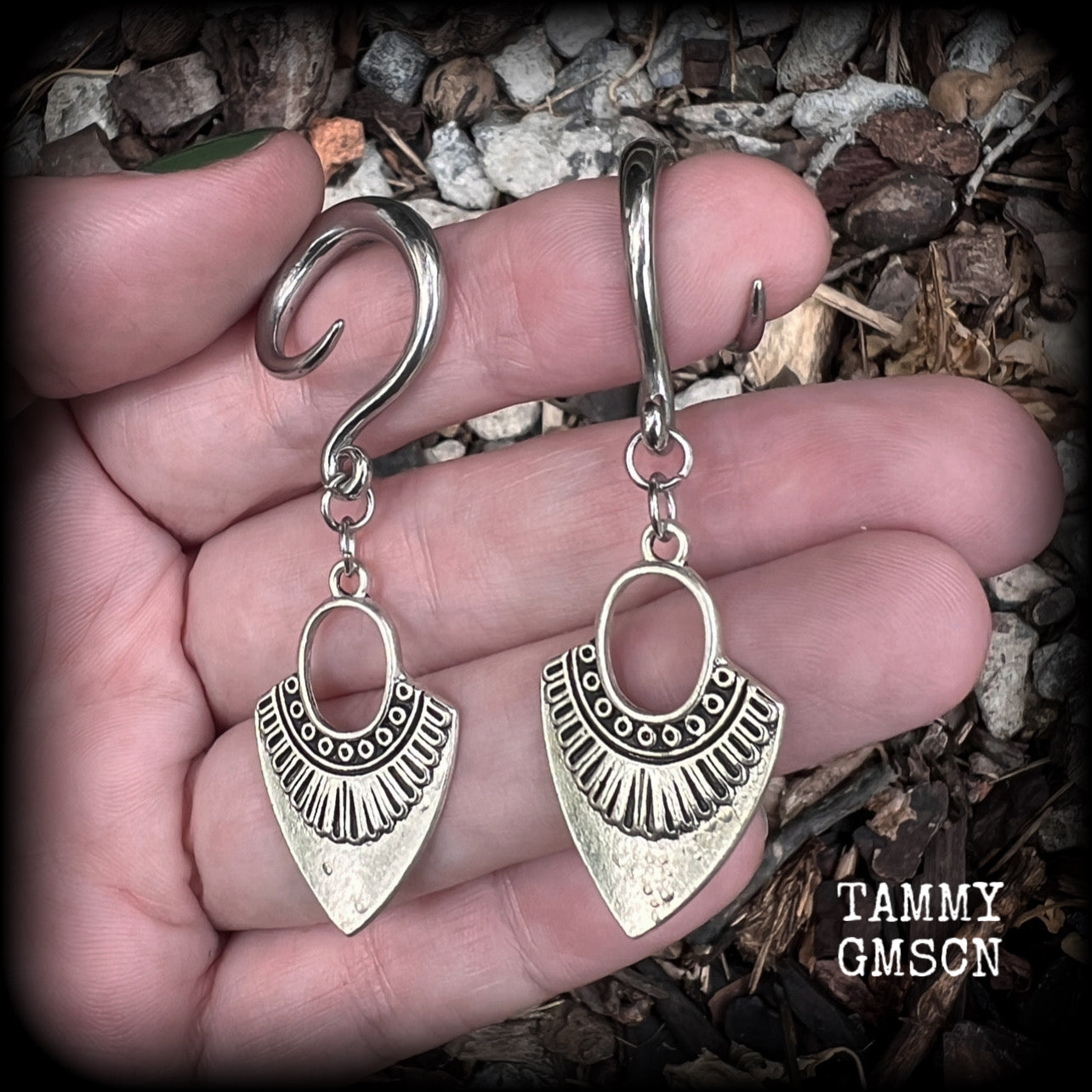 Inspired by Ishtar, Mesopotamian Goddess of love, beauty, sex and war, these beautiful tribal antique silver gauged earrings are nice and light weight, weighing approx 5 grams a piece, and are nice and dangly, measuring just on 6cms from tip to tip.
This pair has been made on 6 gauge (4mm) surgical steel full curl hooks, to be worn in stretched lobes.