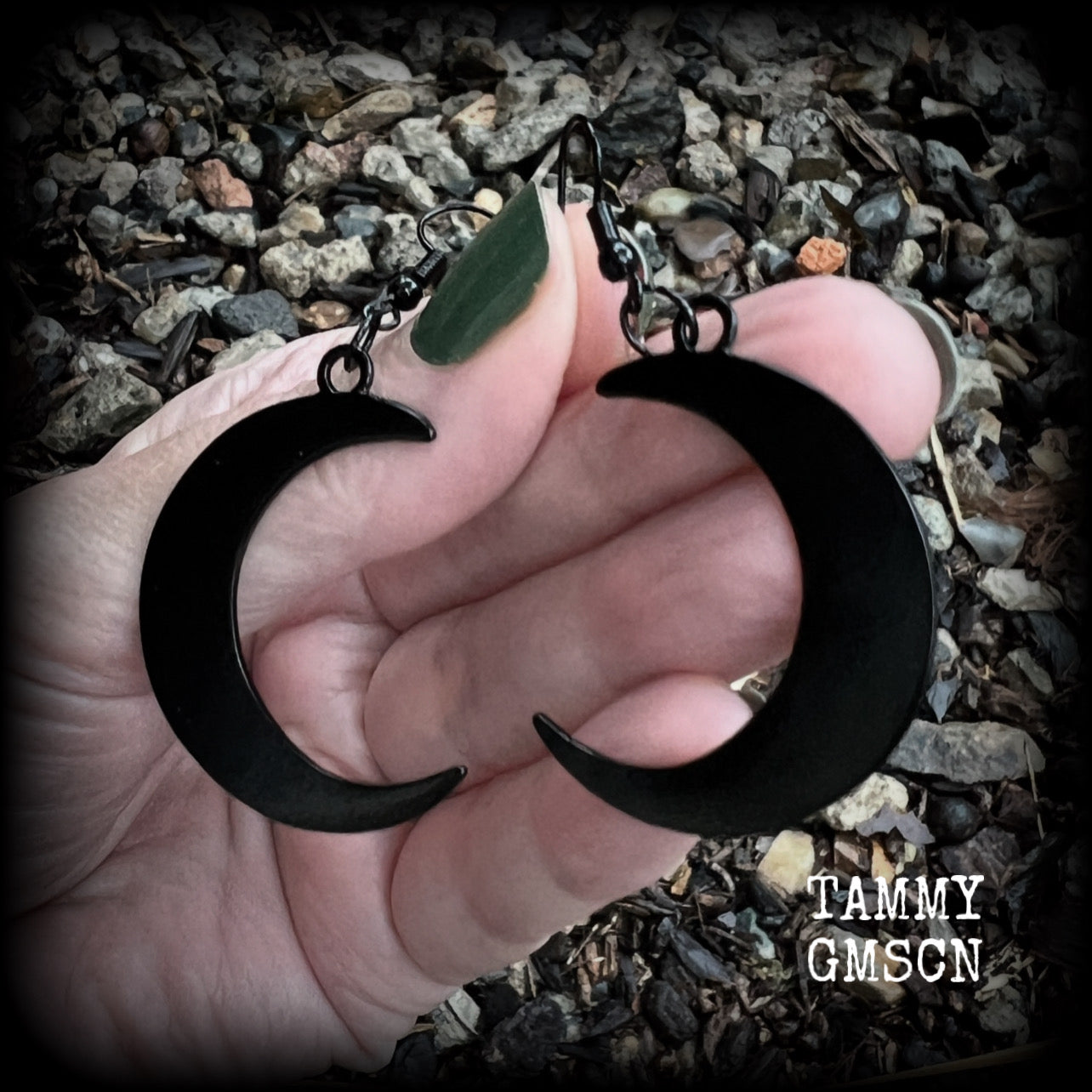 Featuring large black enamel crescent moons, these stunning crescent moon earrings measure just under 7cms from tip to tip and are nice and light weight at approx 5 grams each.

This pair has been made with french hooks, for pierced ears.
