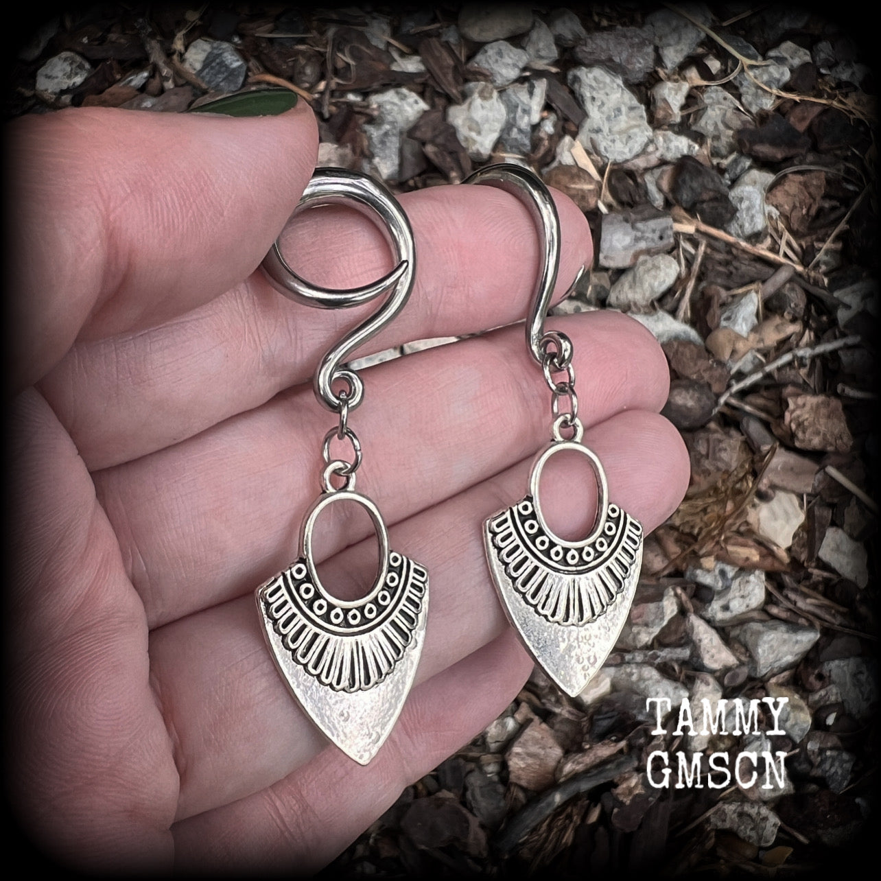 Inspired by Ishtar, Mesopotamian Goddess of love, beauty, sex and war, these beautiful tribal antique silver gauged earrings are nice and light weight, weighing approx 5 grams a piece, and are nice and dangly, measuring just on 6cms from tip to tip.
This pair has been made on 6 gauge (4mm) surgical steel full curl hooks, to be worn in stretched lobes.
