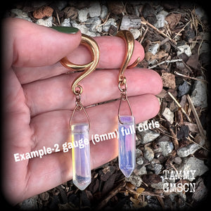 Featuring milky white opalite points, these gorgeous gauged earrings measure 7.5cms from tip to tip, and weigh approx 11 grams each.
This pair has been made on 2 gauge (6mm) rose gold tone surgical steel full curl hooks, suitable for stretched lobes.