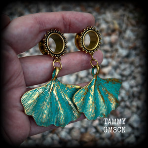 These beautiful boho tunnel earrings feature gorgeous patina ginkgo leaves, weighing approx 16 grams each and measuring  just under 7.5cms from tip to tip.

This pair has been made with 9/16” gauge (14mm) ornate surgical steel screw fit tunnels.