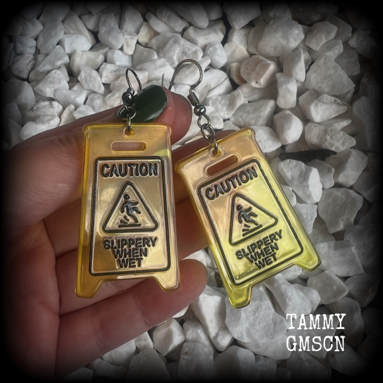These awesome fluoro yellow acrylic ‘Slippery when wet’ sign earrings measure in at just on 7cms, are nice and light weighing only 4 grams each.

This pair has been made with stainless steel french hooks, for pierced ears.