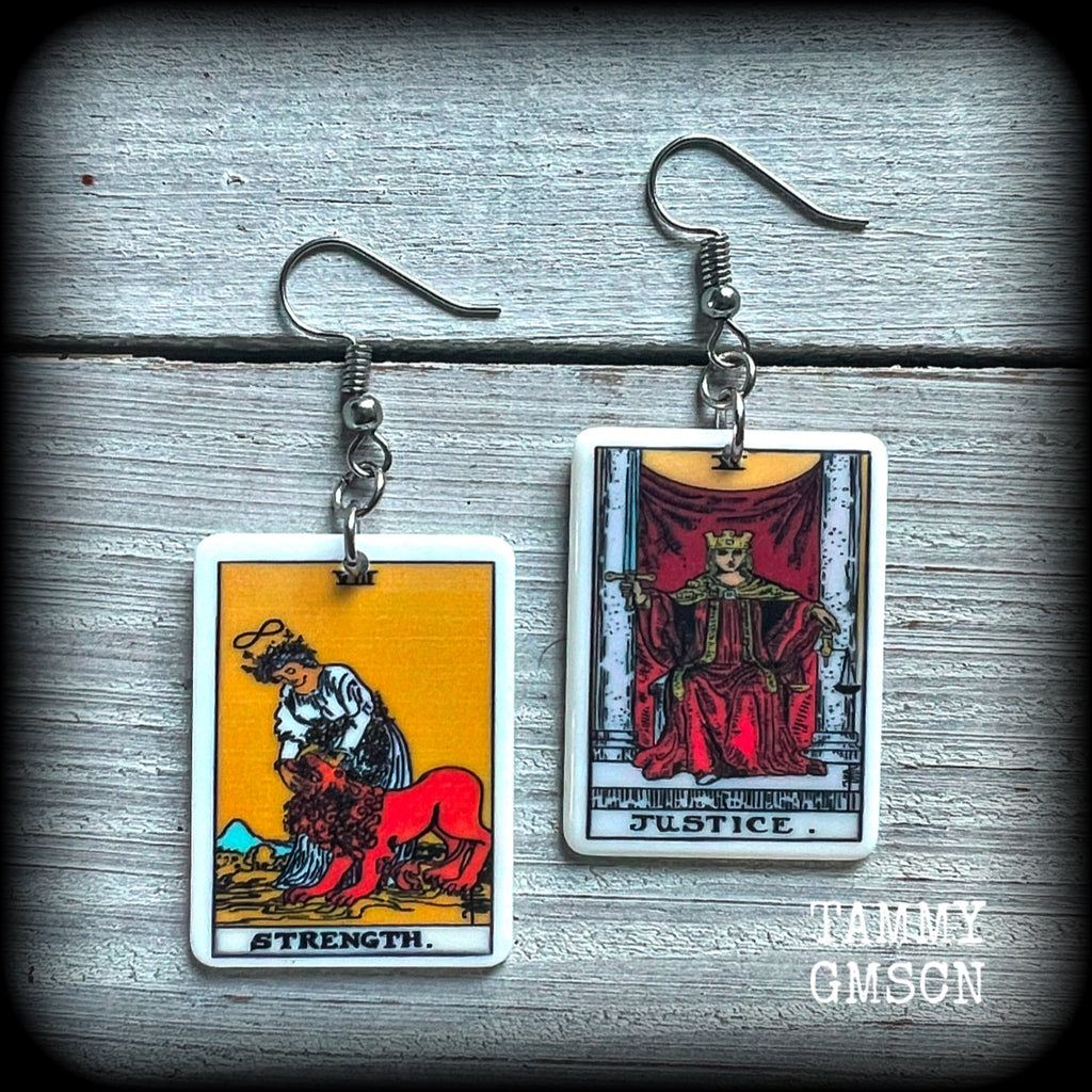 These classic Major Arcana earrings feature lightweight acrylic 'Strength' and ‘Justice’ tarot card charms, measuring just under 6cms from tip to tip, and weighing only a few grams each.

This pair has been made with stainless steel french hooks, suitable for pierced ears.