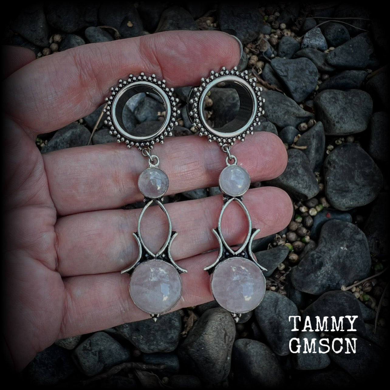 These beautiful earrings have been made with gorgeous translucent pink rose quartz gemstones in a beautiful big boho antique silver setting, weighing approx 13 grams each and measure just over 7cms from tip to tip.
This pair has been made with 5/8” gauge (16mm) gauge ornate surgical steel screw fit tunnels.