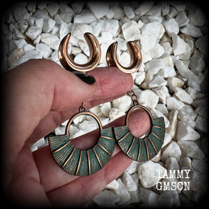 Inspired by Ishtar, Mesopotamian Goddess of love, beauty, sex and war, these beautiful patina and rose gold battle shield gauged earrings weigh approx 8 grams a piece, and measure just under 7 cms from tip to tip.

This pair have been made on 5/8” gauge (16mm) surgical steel cradles, suitable for stretched lobes.