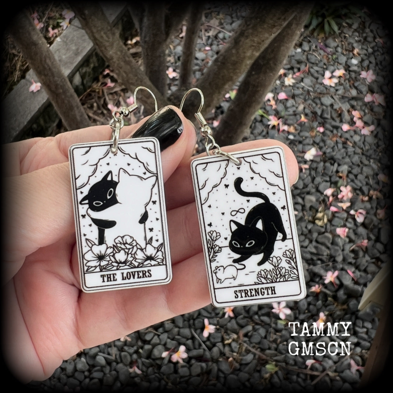 These adorable cat tarot earrings feature The Lovers and Strength lightweight tarot card charms, weighing only a few grams each, and measure approx 5cms from tip to tip.

This pair has been made with stainless steel french hooks, for pierced ears.
