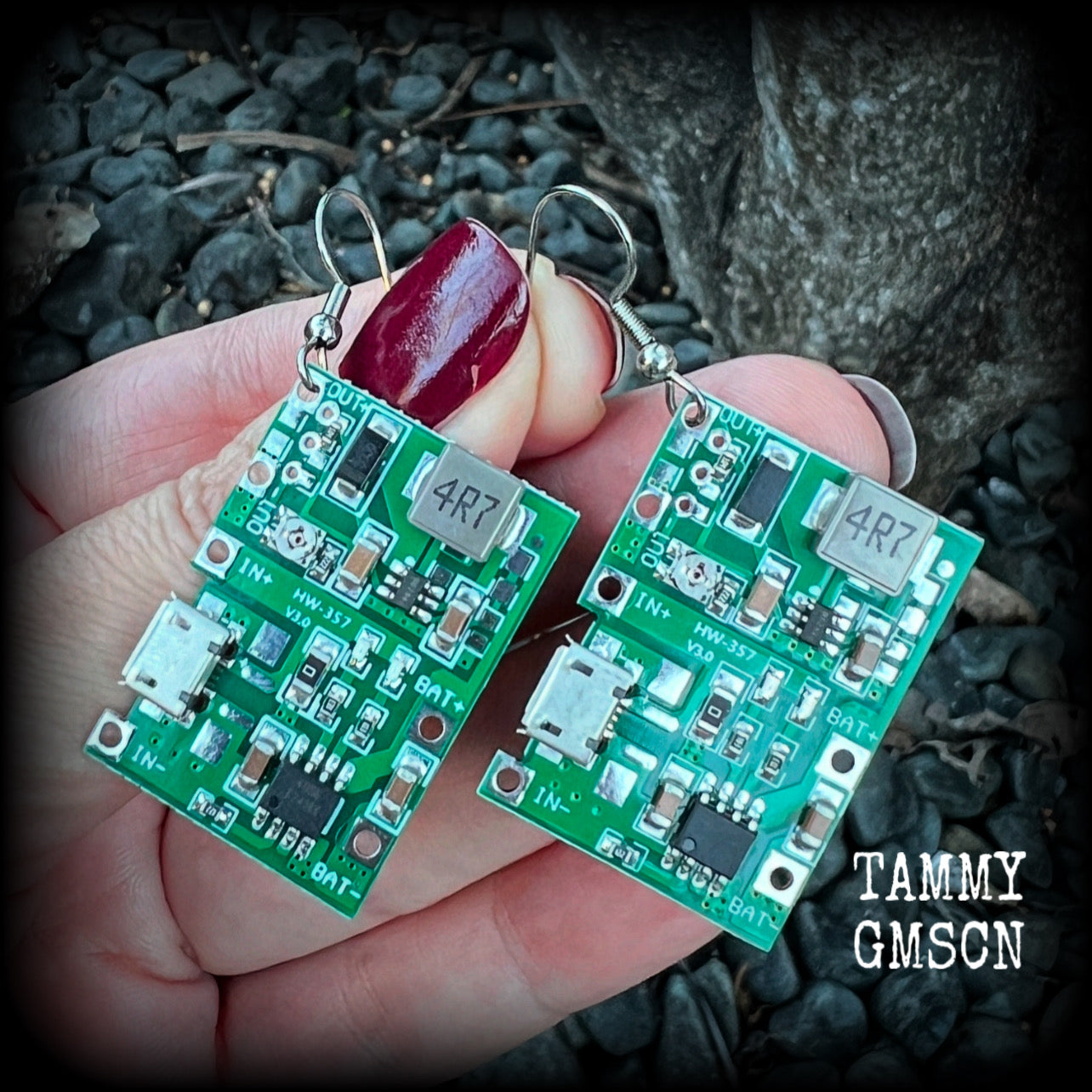 These awesome cyberpunk circuit board earrings measure just under 6 cms from tip to tip, and weigh only a few grams each, these are lovely and lightweight and not too dangly.

This pair has been made on stainless steel french hooks, to be worn in pierced ears.