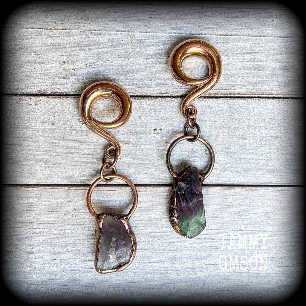 Fluorite ear gauges