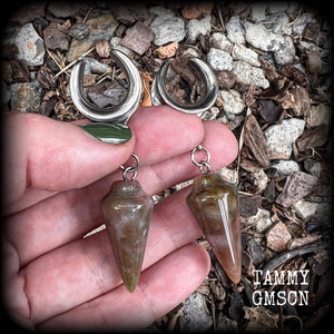 This is a pair of unique beautiful caramel coloured Indian agate gauged earrings, weighing in at approx 11 grams each, and measuring approx 7 cms from tip to tip.
This pair has been made with 5/8” gauge (16mm) stainless steel cradles, suitable for stretched lobes.