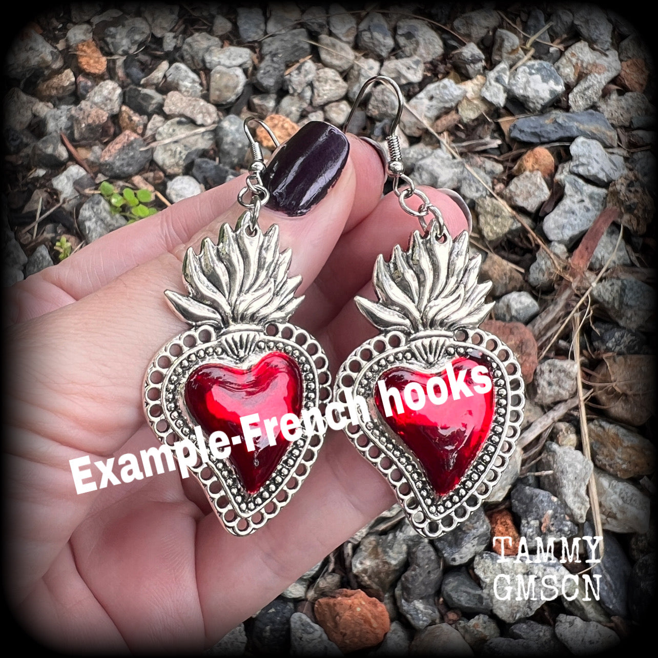 These beautiful red enamel and antique silver sacred heartearrings are nice and lightweight at approx 5 grams a piece, measuring just over 7cms from tip to tip.


This pair has been made on stainless steel french hooks to be worn through pierced ears.