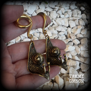 These awesome brass snail ear hangers feature gorgeous brass garden snails, measuring just on 7.5cms from tip to tip, and weighing approx 30 grams each.

This pair has been made on 2 gauge (6mm) surgical steel full curls, suitable for stretched lobes.
