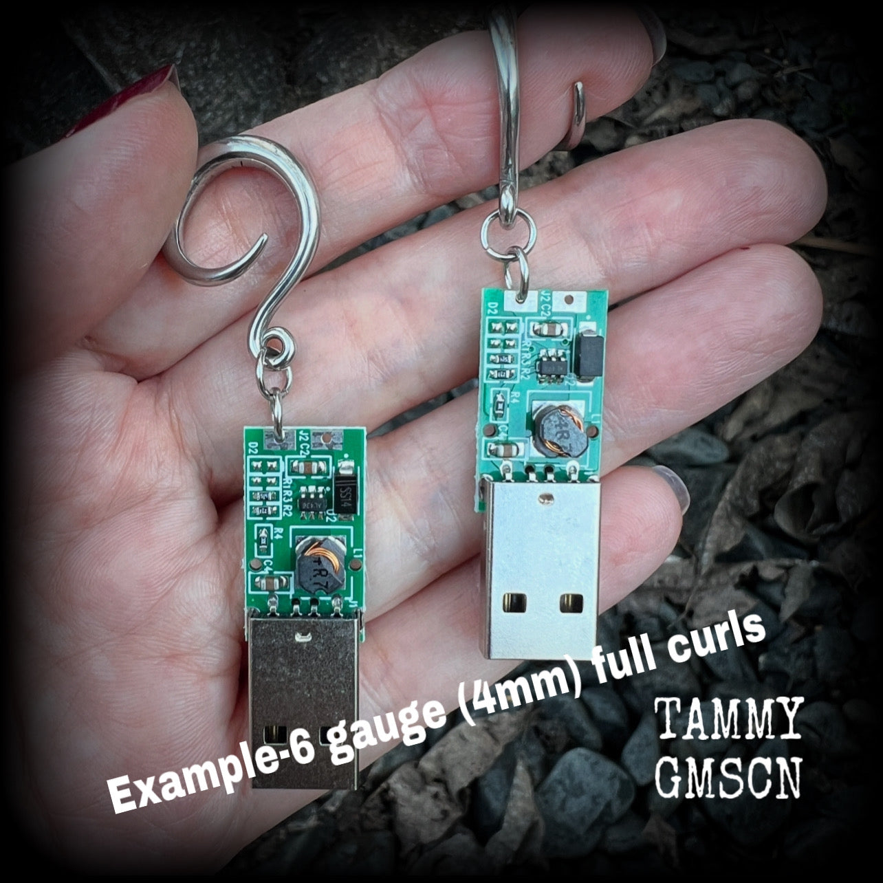 These awesome earrings feature a classic green USB, are nice and dangly, measuring approx 7cms from tip to tip, and nice and light weight, weighing only 6 grams each.

This pair has been made on 6 gauge (4mm) surgical steel full curl hooks, to be worn in stretched lobes.