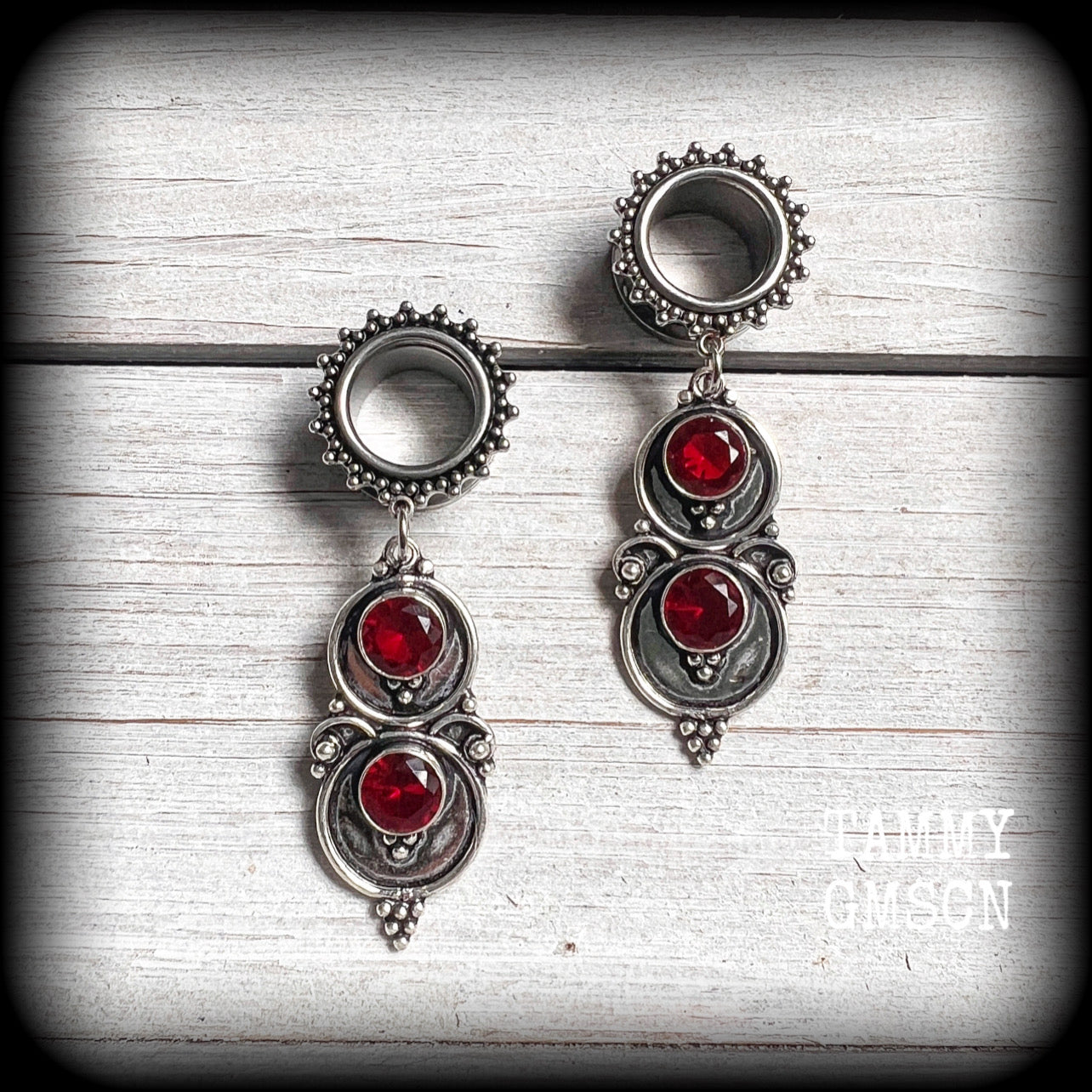 Ornate Garnet gemstone tunnel dangles