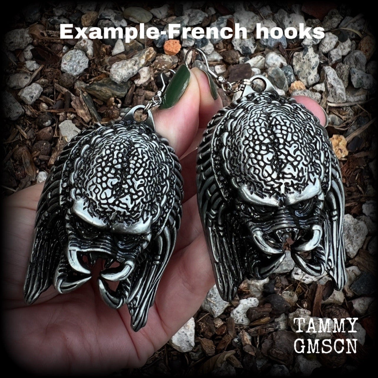 This is a pair of awesome Predator earrings! These are nice and big measuring approx 9.5cms from tip to tip, and weigh 33 grams each (these are HEAVY).

This pair have been made on stainless steel french hooks-for stretched lobes.

