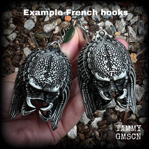 This is a pair of awesome Predator earrings! These are nice and big measuring approx 9.5cms from tip to tip, and weigh 33 grams each (these are HEAVY).

This pair have been made on stainless steel french hooks-for stretched lobes.

