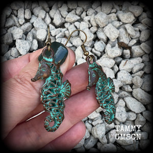 This pair of earrings features a gorgeous antique verdigris patina seahorse, measuring just under 6cms from tip to tip, and weighing 7 grams each.

This pair has been made with french hooks, for pierced ears.