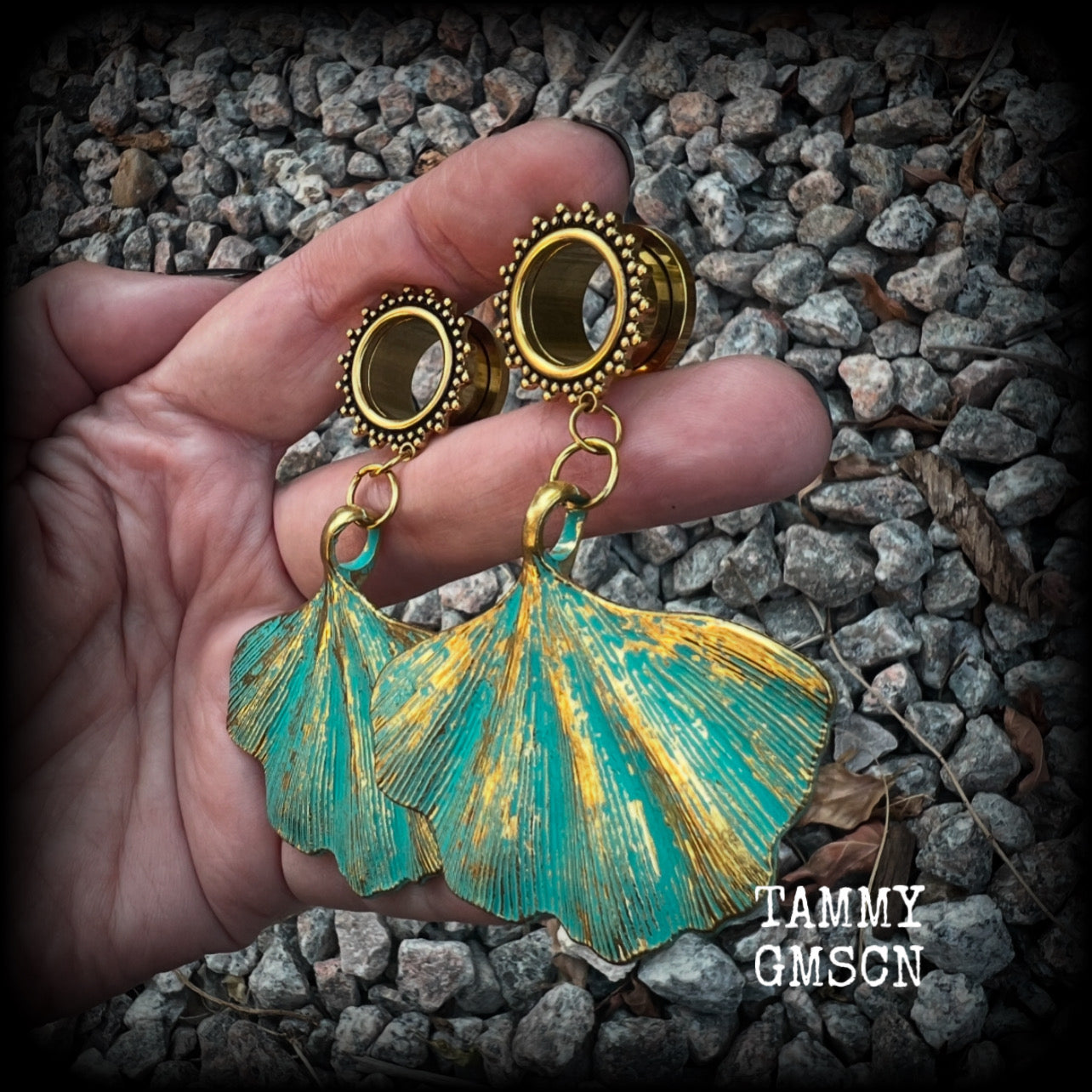 These beautiful boho tunnel earrings feature gorgeous patina ginkgo leaves, weighing approx 16 grams each and measuring  just under 7.5cms from tip to tip.

This pair has been made with 9/16” gauge (14mm) ornate surgical steel screw fit tunnels.