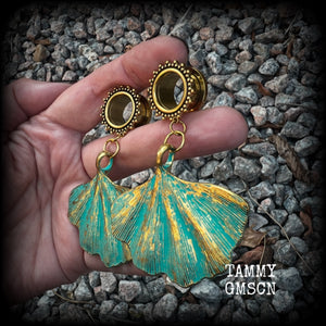 These beautiful boho tunnel earrings feature gorgeous patina ginkgo leaves, weighing approx 16 grams each and measuring  just under 7.5cms from tip to tip.

This pair has been made with 9/16” gauge (14mm) ornate surgical steel screw fit tunnels.
