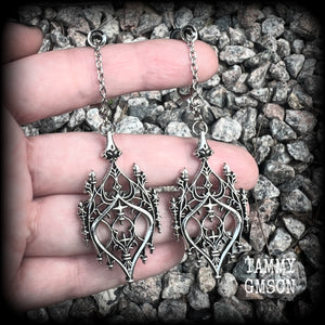 These gorgeous gothic earrings feature a beautiful antique silver ornate gothic cathedral architectural arch, measuring just on 8.5cms from tip to tip, and weighing approx 7 grams each.

 💥This listing includes one pair of surgical steel single flared O-ring earlets