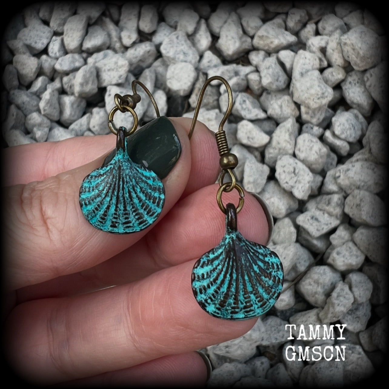 This is a simpler pair of earrings from our Sea Hag range, featuring a single gorgeous verdigris patina charm shell, measuring just under 4cms from tip to tip and weighing only a few grams each.

This pair has been made with antique bronze french hooks, for pierced ears.