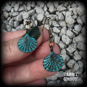 This is a simpler pair of earrings from our Sea Hag range, featuring a single gorgeous verdigris patina charm shell, measuring just under 4cms from tip to tip and weighing only a few grams each.

This pair has been made with antique bronze french hooks, for pierced ears.