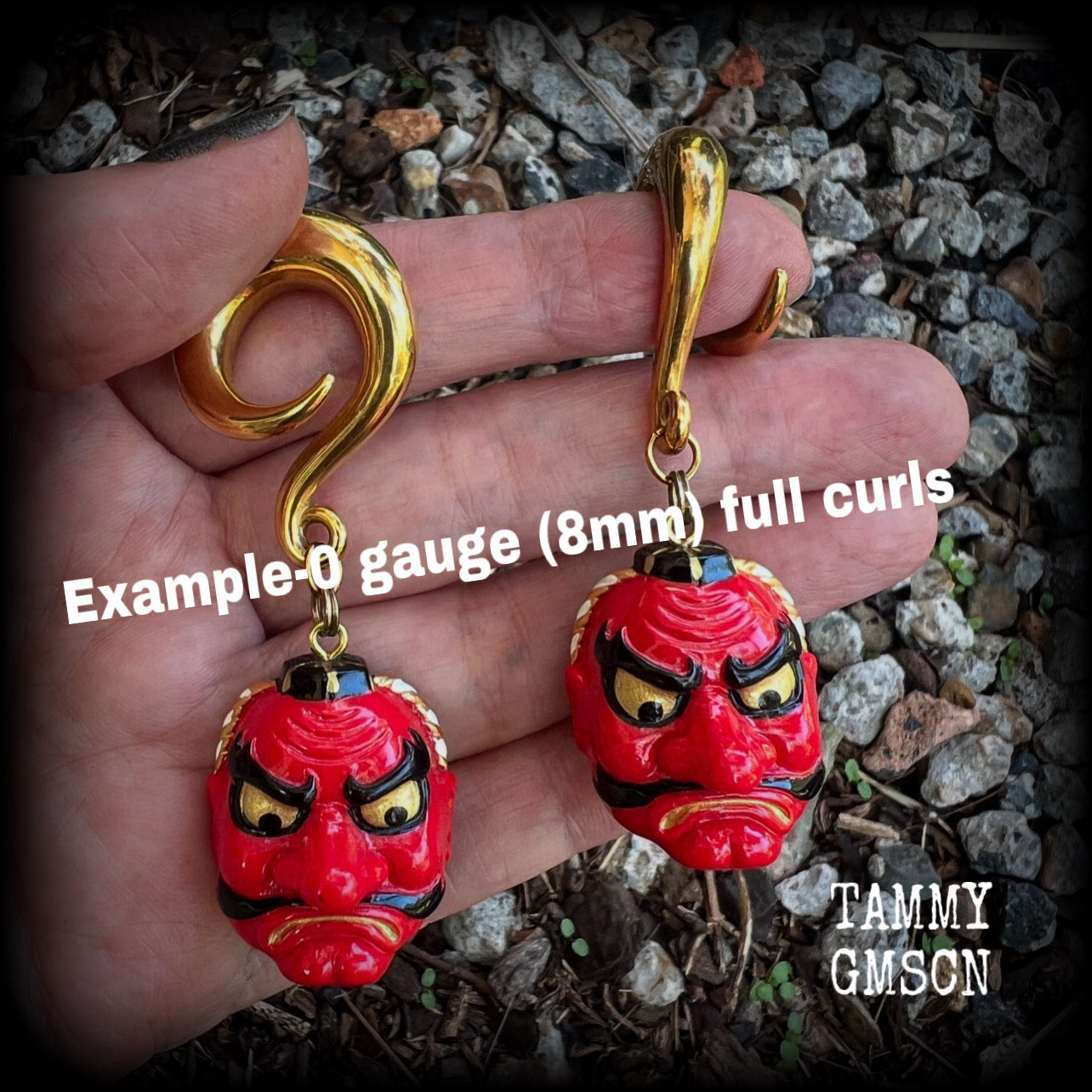 These unique earrings feature bright red painted resin tengu masks, measuring just on 7.5cms from tip to tip and weighing approx 25 grams each.
This pair has been made on 0 gauge (8mm) surgical steel full curl hooks, suitable for stretched lobes.