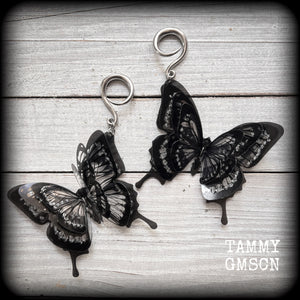 These gorgeous gauged glittery earrings feature beautiful big swallowtail butterflies, super lightweight at just 5 grams a piece, measuring 11cms from tip to tip.

This pair have been made on 6 gauge (4mm) surgical steel full curls, to be worn through stretched lobes.
