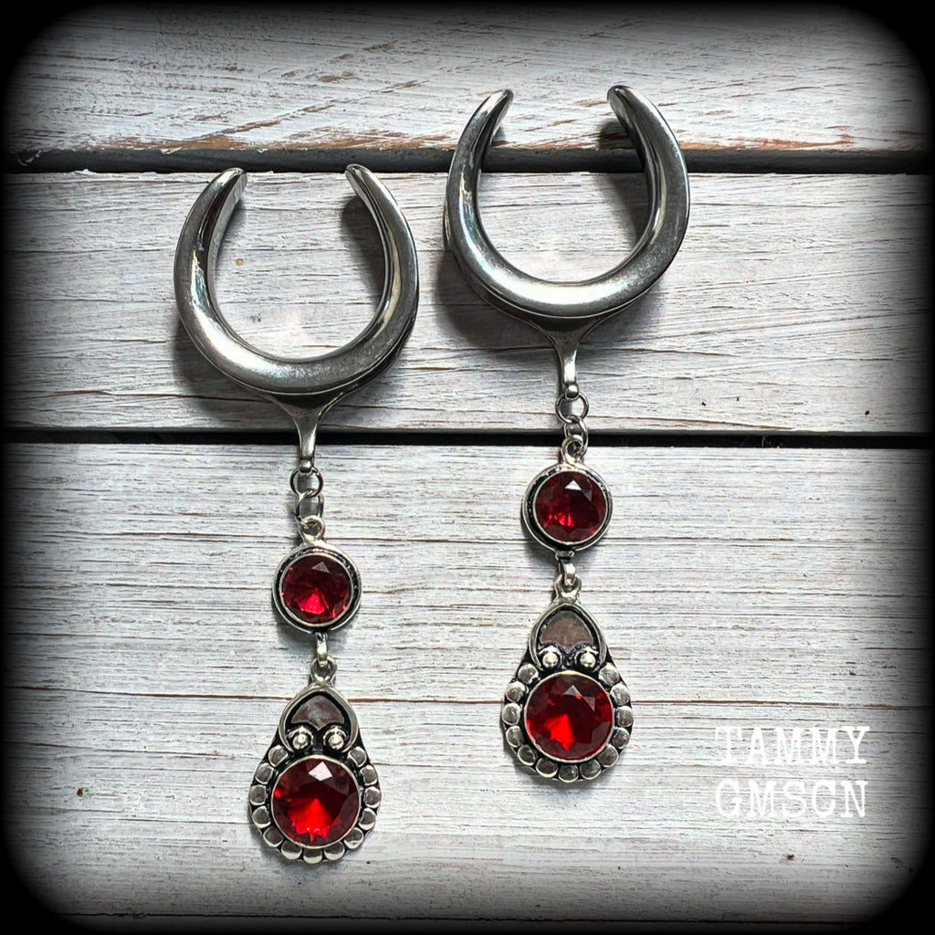 These beautiful boho Garnet ear hangers are made with gorgeous facet gemstones in a beautiful boho antique silver setting, measuring just on 10cm from tip to tip, and weighing 18 grams each, nice and lightweight.

These earrings have been made on 1.18" gauge (30mm) surgical steel cradles, to be worn in stretched lobes.

