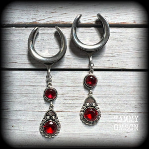 These beautiful boho Garnet ear hangers are made with gorgeous facet gemstones in a beautiful boho antique silver setting, measuring just on 10cm from tip to tip, and weighing 18 grams each, nice and lightweight.

These earrings have been made on 1.18" gauge (30mm) surgical steel cradles, to be worn in stretched lobes.

