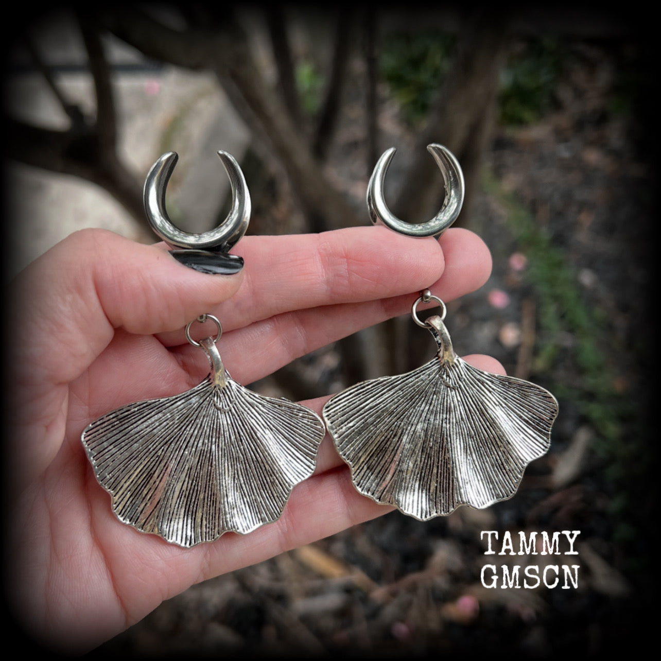 Inspired by Gaia, these beautiful big gauged earrings feature antique silver ginkgo leaves, weighing approx 16 grams a piece, and are nice and dangly, measuring just over 8cms from tip to tip.

This pair has been made on 3/4” gauge (19mm) surgical steel cradles, to be worn in stretched lobes.
