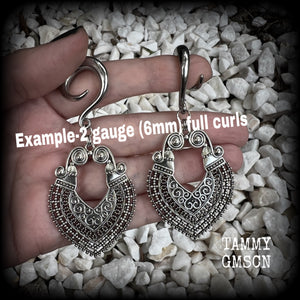 These beautiful ornate gauged earrings are inspired by Aphrodite, the Greek Goddess of love and beauty, weighing approx 14 grams a piece and measuring just over 8cms from tip to tip.

This pair have been made with 2 gauge (6mm) surgical steel full curl hooks, to be worn in stretched lobes.