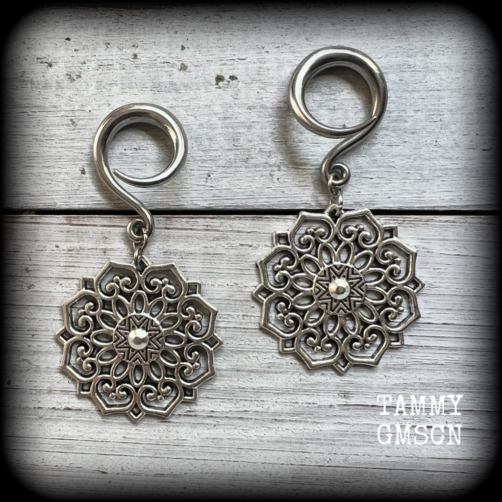 These beautiful antique silver mandala gauged earrings are nice and light weight, weighing approx 6 grams a piece, measuring approx 6cms from tip to tip.

This pair have been made on 6 gauge (4mm) surgical steel full curl hooks, suitable for stretched lobes.