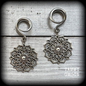 These beautiful antique silver mandala gauged earrings are nice and light weight, weighing approx 6 grams a piece, measuring approx 6cms from tip to tip.

This pair have been made on 6 gauge (4mm) surgical steel full curl hooks, suitable for stretched lobes.