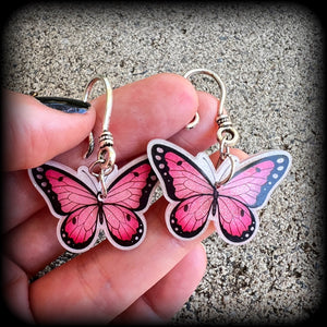 This is a pair of beautiful pink butterfly earrings, available on a selection of hooks and clasps for pierced ears and stretched lobes.