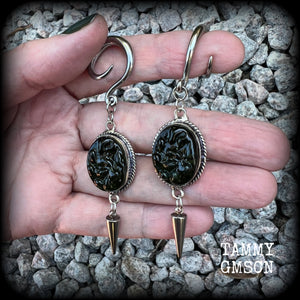 This pair of earrings features gorgeous forest green moldavite gemstones in a boho antique silver setting, weighing approx 10 grams a piece and measuring just on 8cms from tip to tip.  This pair have been made on 6 gauge (4mm) surgical steel full curl hooks, to be worn in stretched lobes.