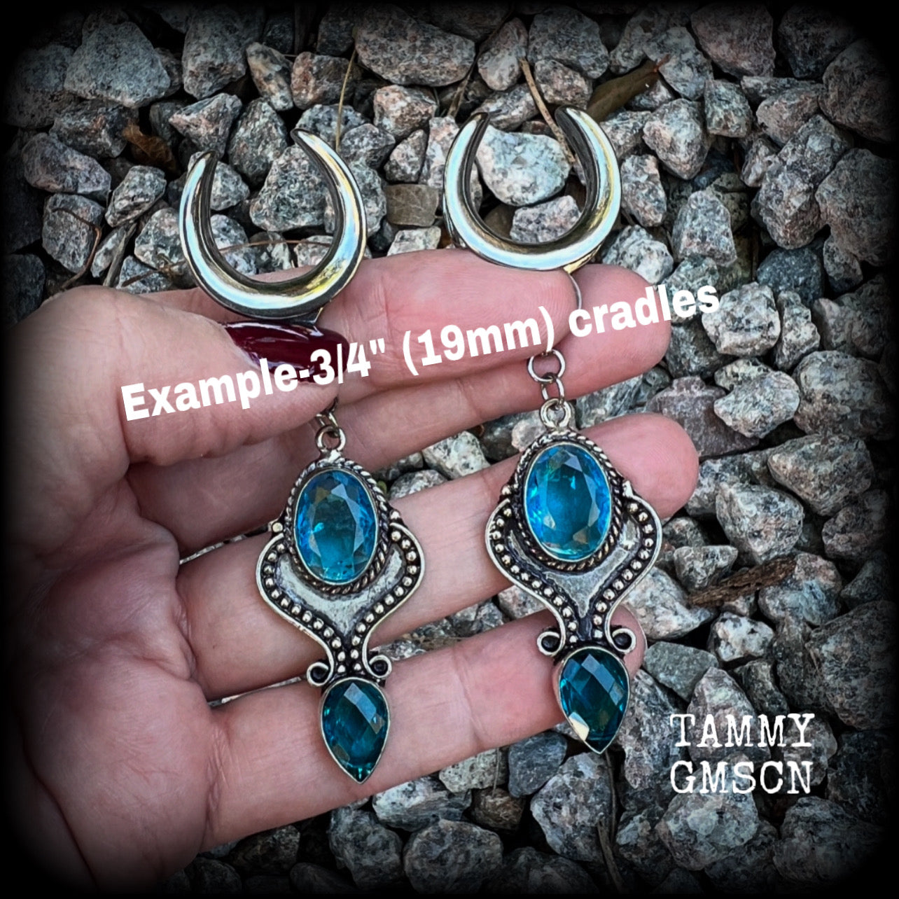 These earrings feature gorgeous facet blue topaz gemstones in a beautiful boho antique silver setting, lovely and dangly at just on 8cms from tip to tip, and not too heavy at 12 grams each.

These earrings have been made on 3/4” gauge (19mm) surgical steel cradles, to be worn in stretched lobes.