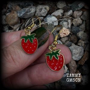 These adorable earrings feature a cute little antique gold strawberry charm. Measuring just under 4cms from tip to tip, these earrings are lovely and lightweight at only a few grams each. This pair have been made on antique gold french hooks.