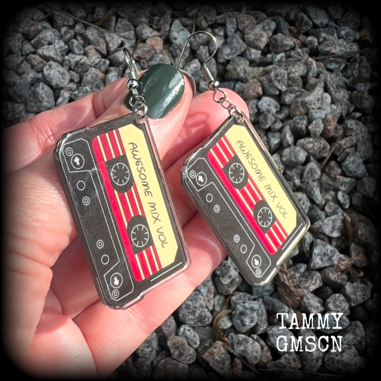This awesome pair of earrings features a pair of classic 80’s mix tapes, are nice and lightweight weighing only a few grams each, and measure approx 7cms from tip to tip.

This pair has been made on stainless steel french hooks, suitable for pierced ears.