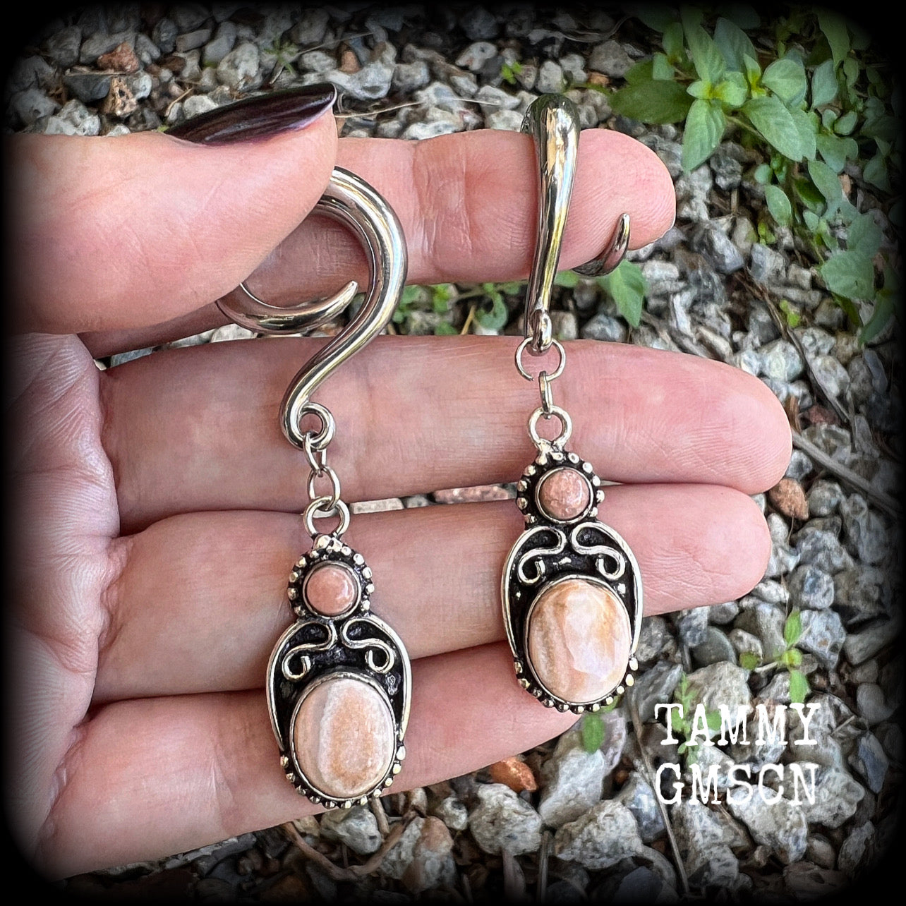 This pair of beautiful rhodochrosite gauged earrings features one smaller gemstone sitting atop a larger oval polished gemstone in a gorgeous boho antique silver setting. choose your own hooks from 6mm up to 30mm.