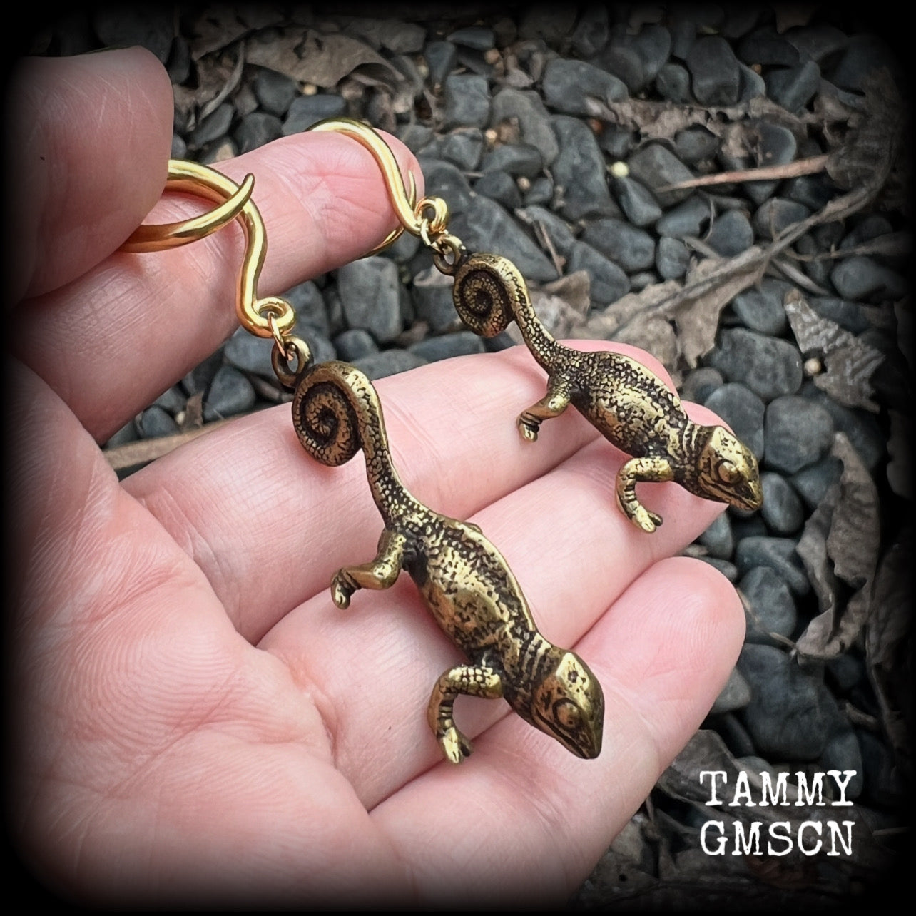 These awesome gauged earrings feature a pair of brass iguanas, are nice and dangly, measuring just on 7.5cms from tip to tip, and weighing approx 13 grams each.

This pair has been made on 6 gauge (4mm) surgical steel full curl hooks, to be worn in stretched lobes.
