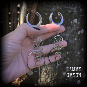 These gorgeous earrings feature beautiful hoops and crescent moons hanging from the elemental symbol for water, weighing approx 12 grams each, measuring just over 13 cms from tip to tip.
This pair has been made on 1" gauge stainless steel cradles.