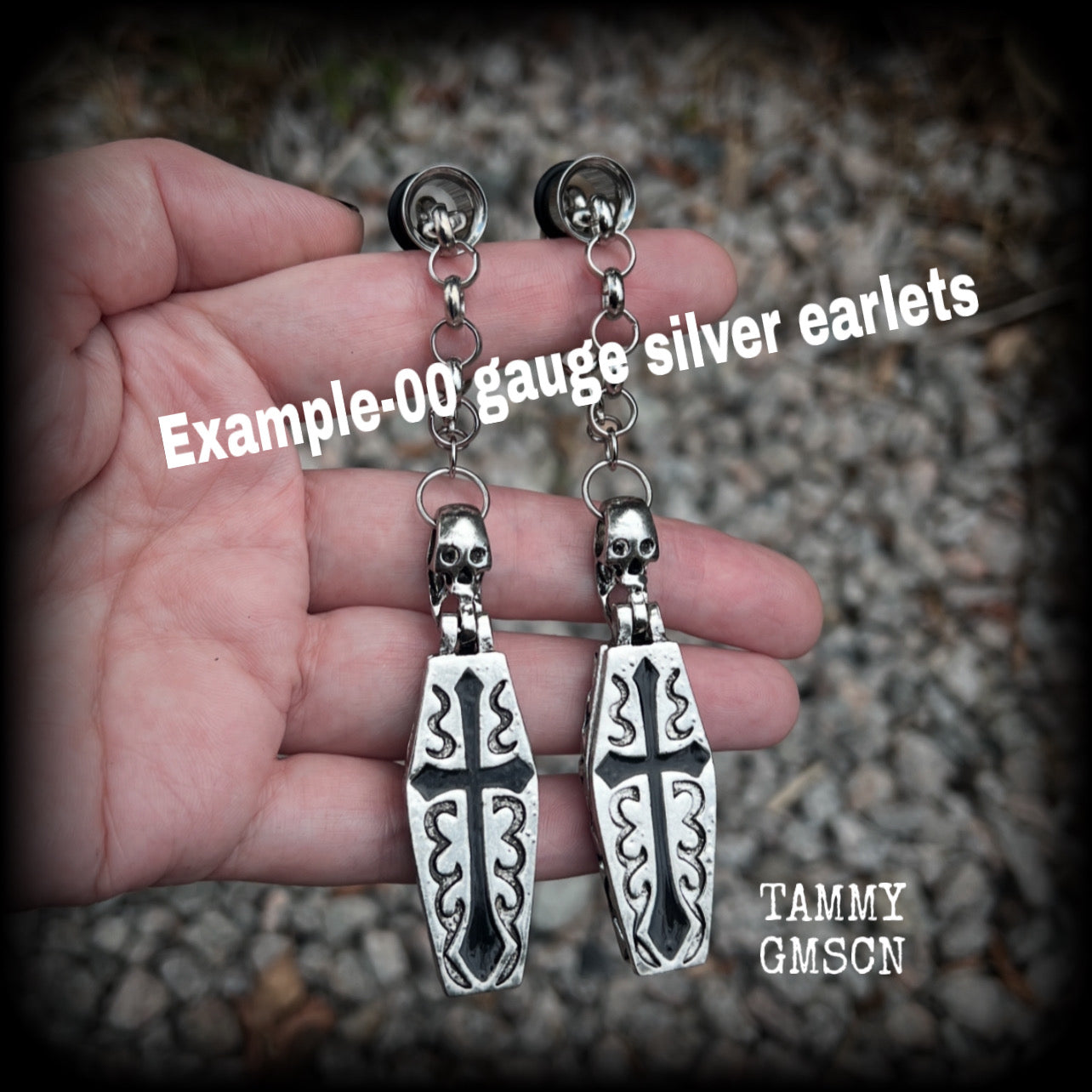These beautiful antique silver and black enamel coffin tunnel dangles are nice and dangly, weighing approx 25 grams each, and measuring just over 11cms from tip to tip.

⚰️ This listing is for a chunky chain/lobster clasp combination suitable for 00 gauge and larger. 
If you choose a smaller size of tunnel than 00 gauge we will make these on a smaller chain.