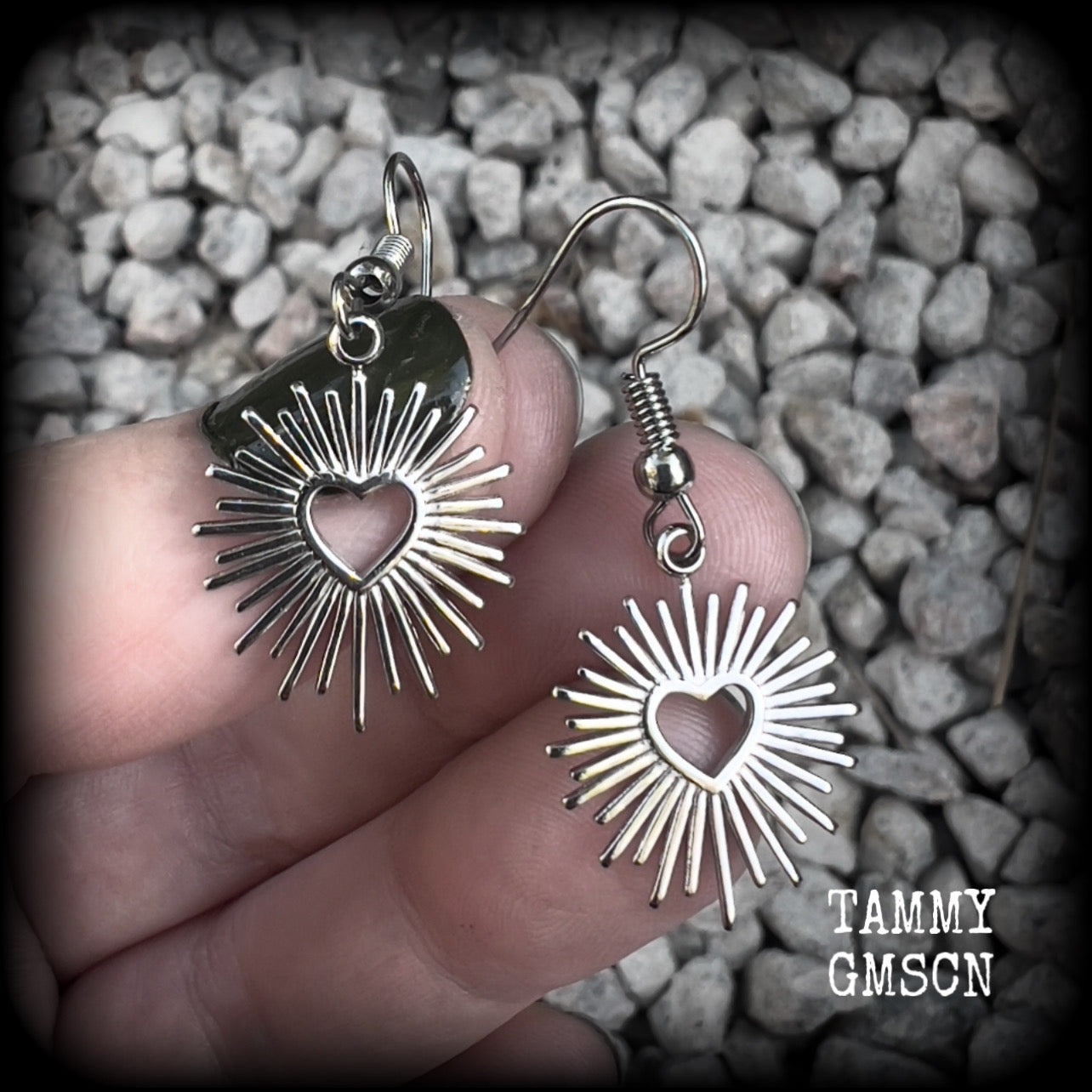 These adorable antique silver sacred heart earrings are nice and lightweight at only a gram or two a piece, and not too dangly, measuring just on 4cms from tip to tip.

This pair has been made on stainless steel french hooks to be worn through pierced ears.