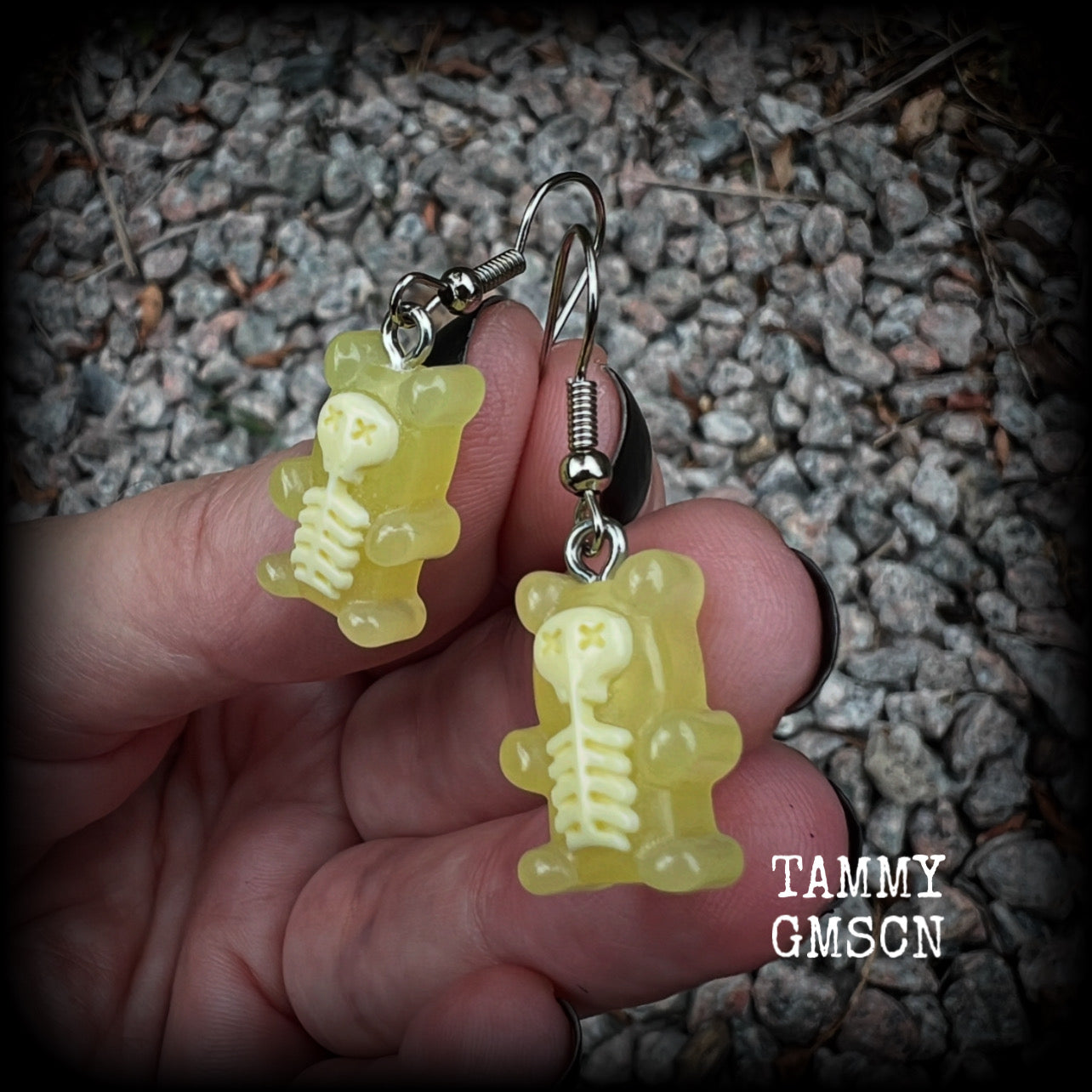 Featuring spooky cute yellow skeleton gummy bears, these adorable earrings measure just on 5cms from tip to tip and are super light weight, weighing only a gram or two each.

This pair has been made with stainless steel french hooks, to be worn in pierced ears.