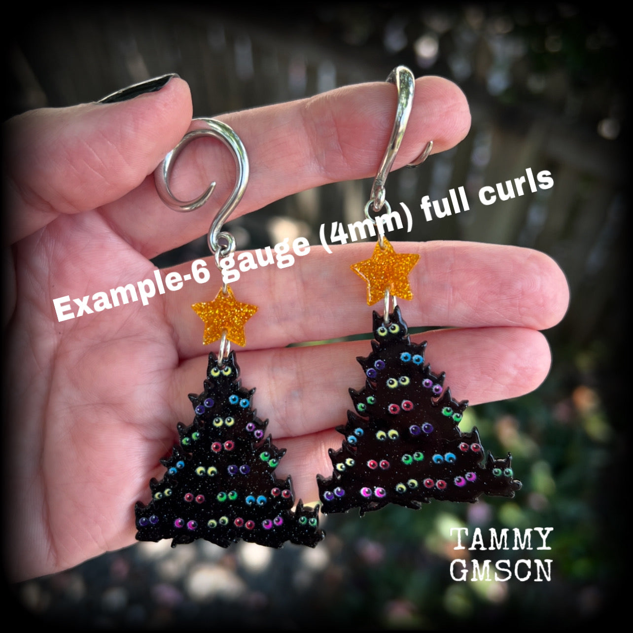 Featuring a spooky cute Christmas tree with STACKED BLACK CATS topped with a glittering gold star, these adorable earrings weigh in at approx 5 grams a piece, and measure approx 8 cms from tip to tip.

This pair has been made on 6 gauge (4mm) surgical steel full curl hooks, to be worn in stretched lobes.