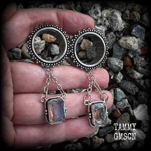 These gorgeous tunnel dangles feature beautiful dangly topaz gemstones set in antique silver, weighing approx 12 grams each and measuring just on 7cms from tip to tip.

This pair has been made with 3/4” gauge (19mm) surgical steel ornate tunnels-for stretched lobes.

