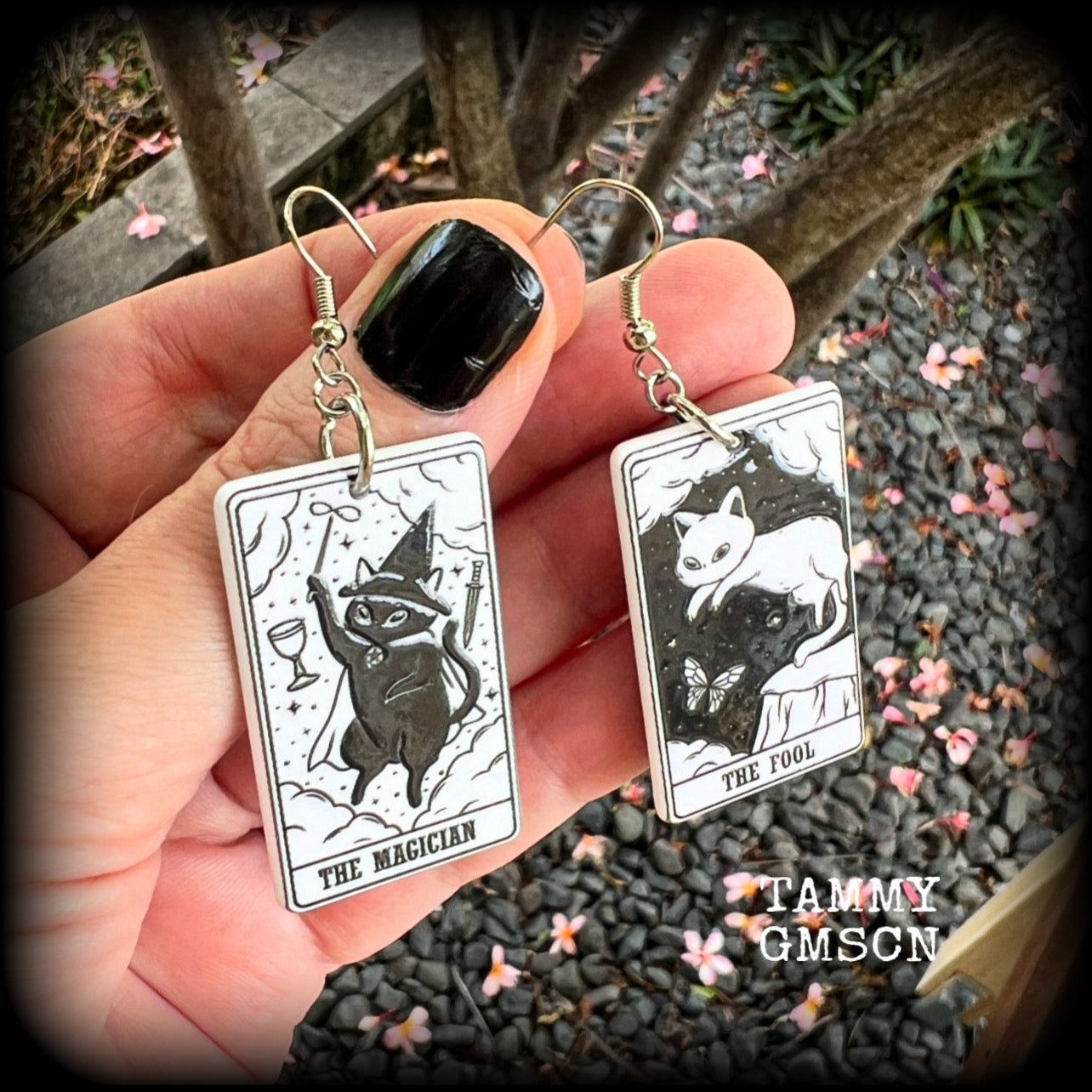 These adorable cat tarot earrings feature The Fool and The Magician lightweight tarot card charms, weighing only a few grams each, and measure approx 5cms from tip to tip.

This pair has been made with stainless steel french hooks, for pierced ears.