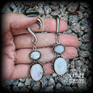 These gauged earrings have been made with gorgeous big polished Rainbow moonstone gemstones in a beautiful boho antique silver setting, measuring approx 8cms from tip to tip, and weighing approx 12 grams each, not too heavy.

These earrings have been made on 2 gauge (6mm) surgical steel half curl hooks, to be worn in stretched lobes.