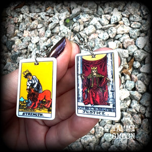 These classic Major Arcana earrings feature lightweight acrylic 'Strength' and ‘Justice’ tarot card charms, measuring just under 6cms from tip to tip, and weighing only a few grams each.

This pair has been made with stainless steel french hooks, suitable for pierced ears.